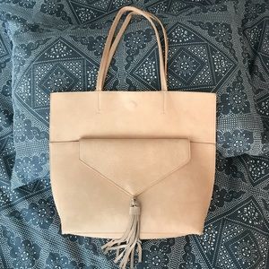 Anthropologie Tote with removable tasseled clutch